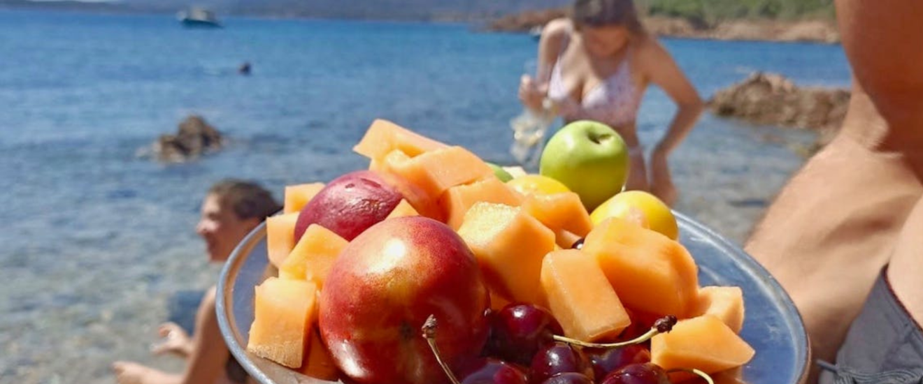 Kayak Tours a bowl of fruit on a plate