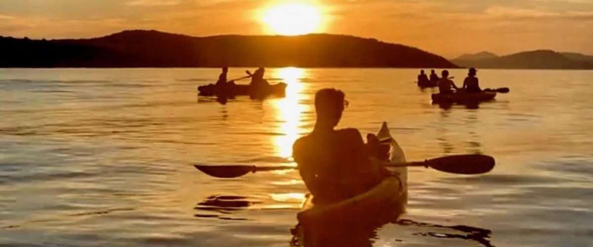 a sunset over a body of water