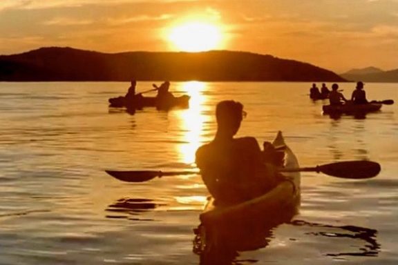 a sunset over a body of water