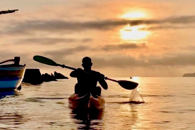 a small boat in a body of water