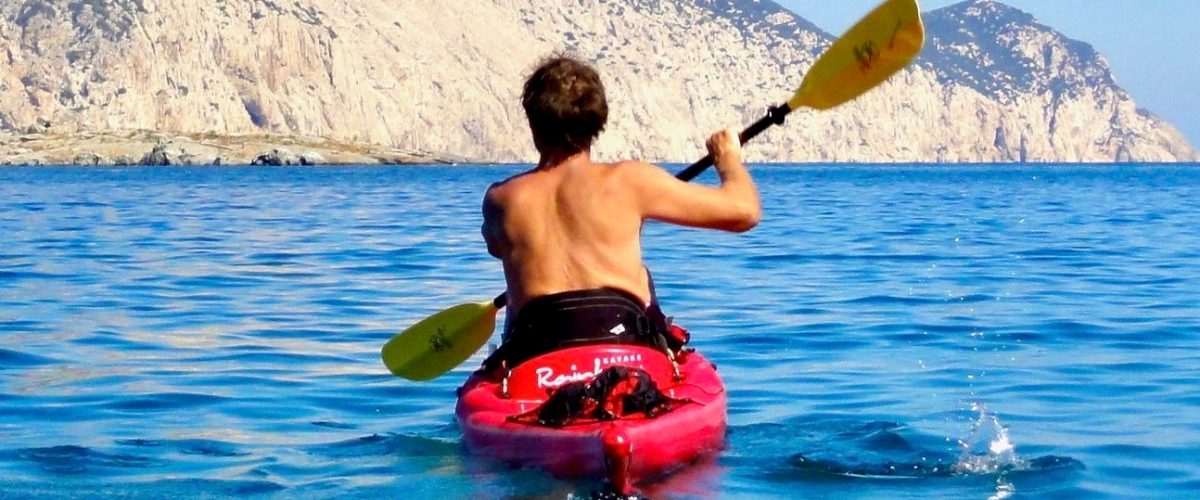 a person riding a surf board on a body of water