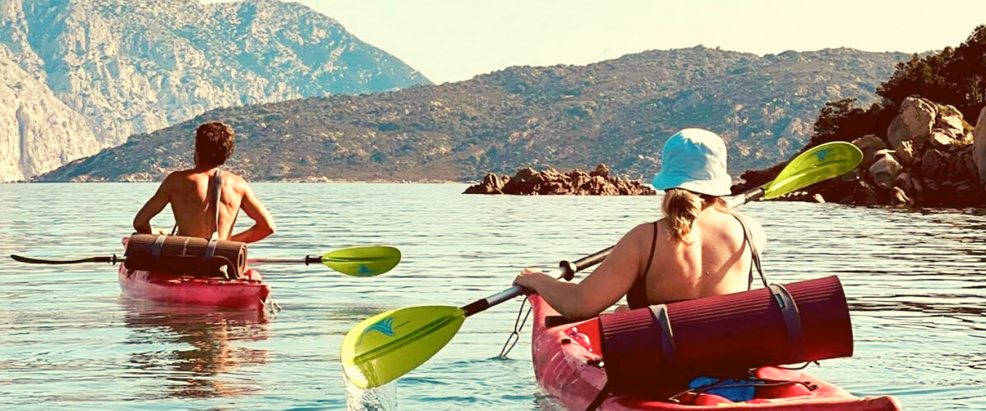 y2 a woman sitting on a boat in the water