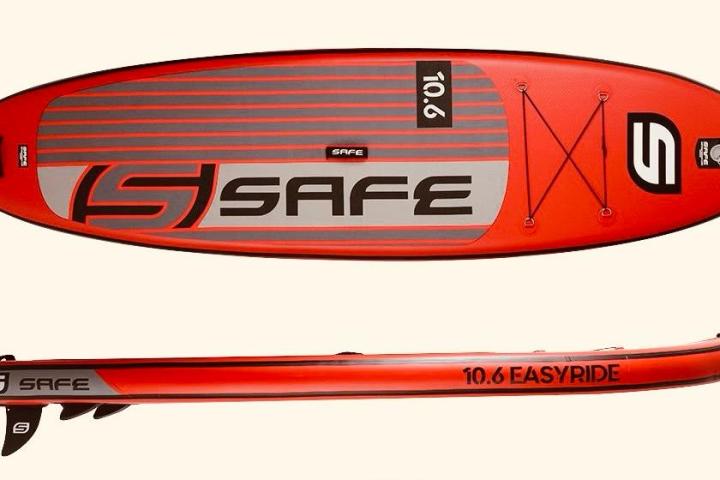 Red inflatable paddleboard with brand logo and the text '10.6 Easy Ride.'